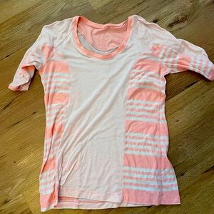 GUC lululemon pink and white striped tee. Unsure of size but fits like a small